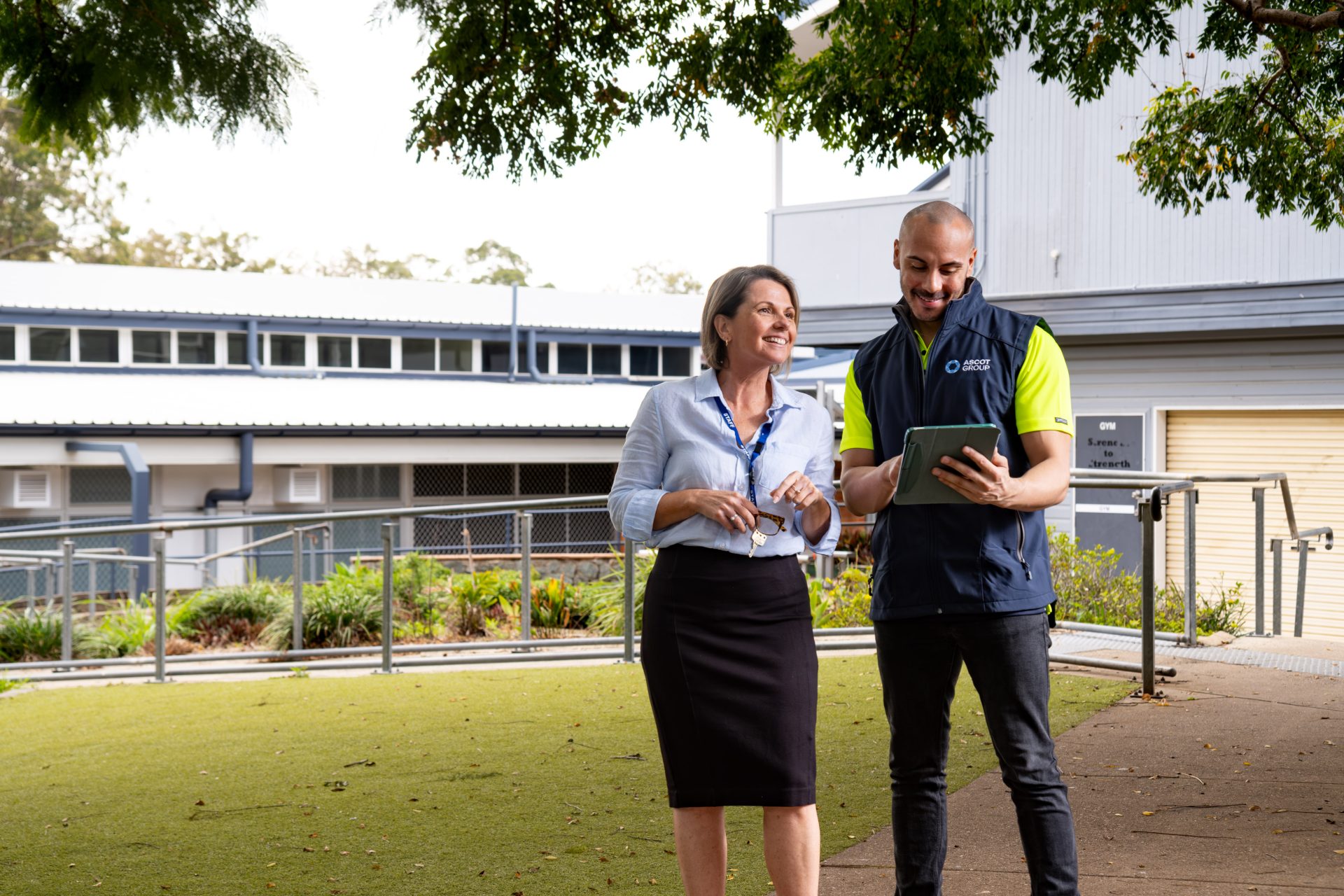 Two Ascot Group team members working together